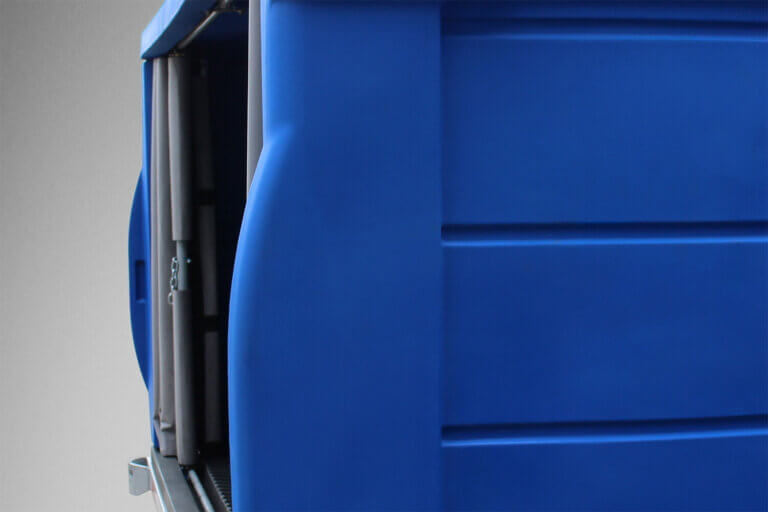 Close-up view of blue plastic exterior panel on an Alpha Cart.