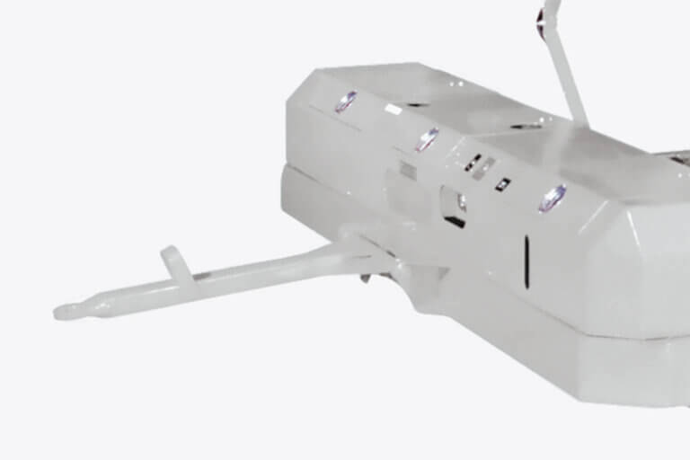 White towbar attachment for mobile scissor lift equipment with illuminated indicators.
